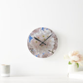 Roze bloesems. ronde klok (Huis)