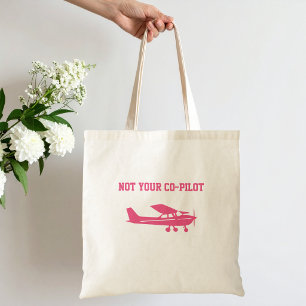 Roze Cessna-vliegtuig Niet Jouw Co-Piloot Grappige Tote Bag
