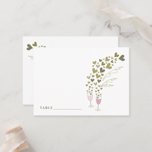 Roze champagne-kasten en gouden harten tijdens het plaatskaartje (Voorkant / Achterkant in situ)