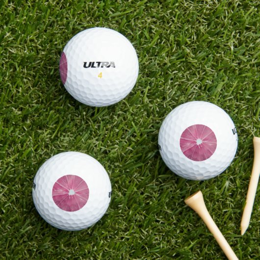 Roze citrusvruchten golfballen (Insitu Gras)