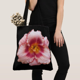 Roze dagleliobloesem op zwarte bloemen tote bag