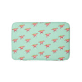 Roze dinosauruspatroon op bleek blauw badmat (Voorkant)