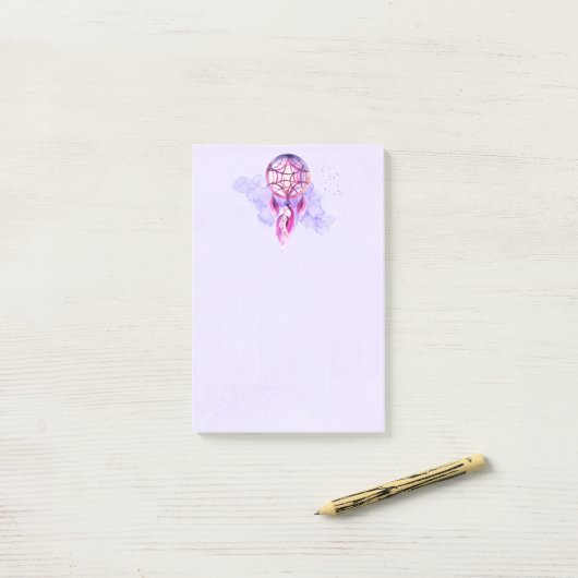 Roze droomvanger op Paarse Waterverf Post-it® Notes (Op bureau)
