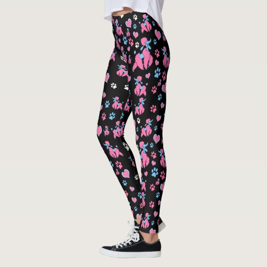 Roze en blauw spiegelpatroon op zwarte achtergrond leggings (Links)
