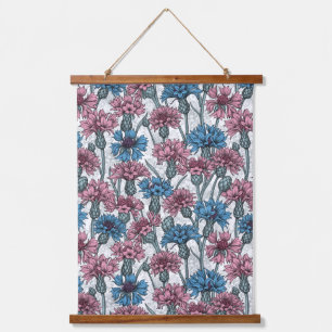 Roze en blauwe cornbloemen op wit hangend wandkleed