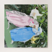 Roze en blauwe draaistellen tegen Angel Trumpets Legpuzzel (Horizontaal)