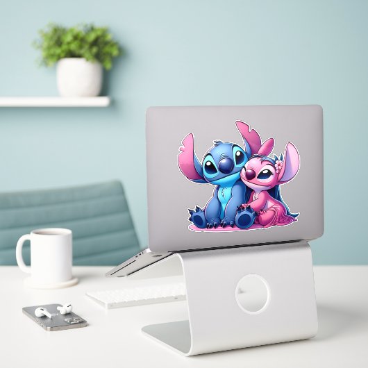 Roze en blauwe steek sticker (Laptop op bureau)
