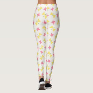 Roze en gele bloemschikking in de vorm van een win leggings