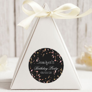 Roze en gouden glitterconfetti op een zwarte achte ronde sticker
