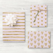 Roze en gouden harten en lijnen inpakpapier vel