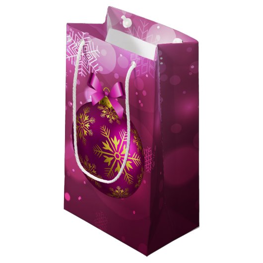 Roze en gouden kersttas met kleine cadeautjes klein cadeauzakje (Voorkant Gekanteld)