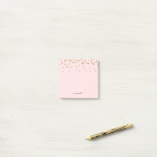 Roze en goudglitter post-it® notes (Op bureau)