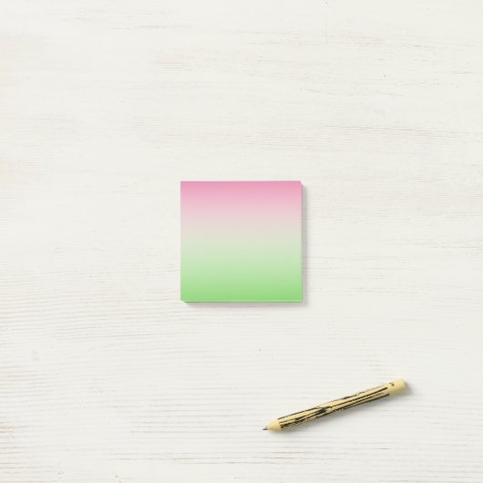 Roze en groene AKA Post-it® Notes (Op bureau)
