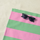 Roze en groene gestreepte geometrische patroon strandlaken (In situ)