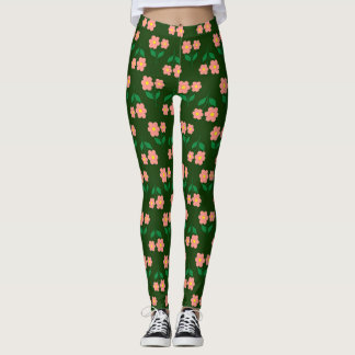 Roze en oranje bloemenprint op rijk groen leggings