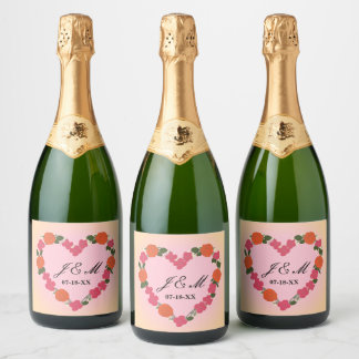 roze en oranje trouwboeket in hartvorm sparkling wijnetiket