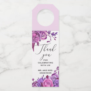 Roze en paarse rozen. Floral bruiloft bedankt Flessenhanger