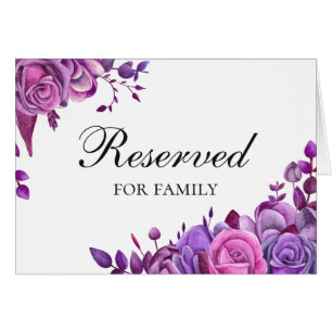 Roze en paarse rozen. Lila bruiloft bord gereserve