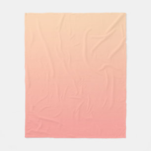 Roze en perzik gradiënt fleece deken