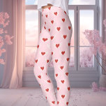 Roze en rode Valentijnsdag gevleugeld hartpatroon Leggings<br><div class="desc">Deze charmante Valentijnsdag leggings tonen een uniek patroon van gevleugelde harten in het rood, geplaatst tegen een zacht roze achtergrond. Deze leggings zijn ideaal om een vleugje romance aan je outfit toe te voegen en zijn ideaal om liefde te vieren, of het nu Valentijnsdag is of een dag waarop je...</div>