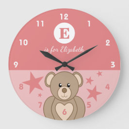 Roze en wit met een knuffel teddy sterren baby naa grote klok