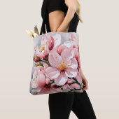 Roze en witte abrikozenbloesems op grijze achtergr tote bag (Dichtbij)