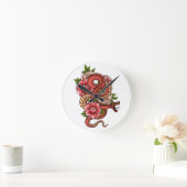 Roze en zwarte bloemendraak te  ronde klok (Huis)