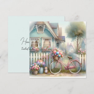 Roze fiets met bloemen bij het hek van het blauwe kaart