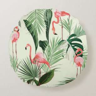 Roze flamingo en exotische bloemen, palmbladeren.  rond kussen