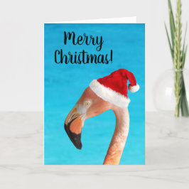 Roze flamingo in een rode kerstmanhoed Kerstkaart Feestdagen Kaart