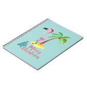 Roze flamingo in een Santa Hat met een palmboomwor Notitieboek (Linkerzijde)