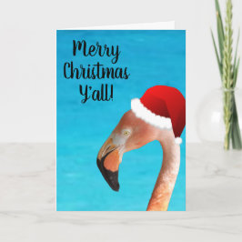 Roze flamingo in rode cartoon kerstman hoed feestdagen kaart