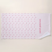 Roze flamingo met de naam roze strandlaken (Voorkant)