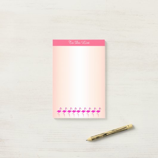 Roze flamingos en kalligrafie op roze tinten post-it® notes (Op bureau)