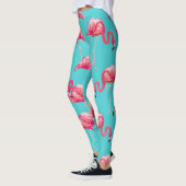 Roze flamingvogels op de achtergrond van turkooize leggings (Links)