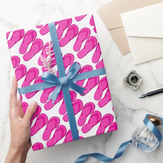 Roze flip flop strand met daarop papier voor verpa (Geschenken)