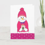 Roze Frosty Snowman met Hot Chocolate Feestdagen Kaart<br><div class="desc">Een schattige feestkaart met een meisje dat een sneeuwpop in een roze toque en roze trui voorstelt. Een warme chocolade in haar handen. Het binnenbericht kan worden geschrapt of worden veranderd zoals gewenst.</div>