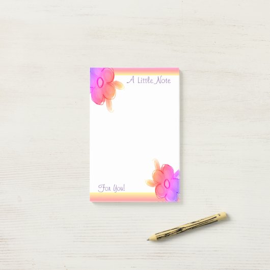 Roze geel en paars post-it® notes (Op bureau)