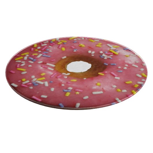 Roze geglazuurde donut met sproinkles snijplank (Hoek)