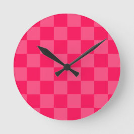 Roze geruite achtergrond ronde klok