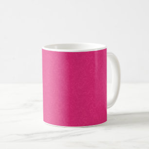 Roze gestructureerd oppervlak met subtiel draaiend koffiemok