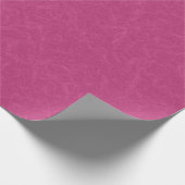 Roze gestructureerd oppervlak met wervelend patroo cadeaupapier (Hoek)