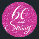 Roze Glitter 60 en Sassy 60th Birthday Ronde Sticker<br><div class="desc">Viel het draaien van 60 in stijl met dit elegante 60ste verjaardagsontwerp op een roze glitterachtergrond. De woorden 60 en sassy worden geplaatst gebruikend modern manuscript en typografie. De gelijkaardige producten zoals uitnodigingen en partijlevering en giften zijn beschikbaar in onze winkel. Als je hulp nodig hebt, kun je contact met...</div>