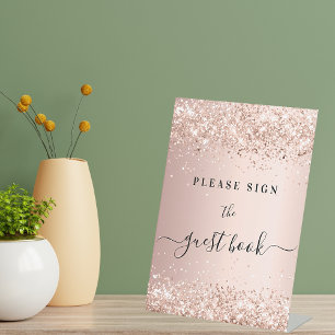 Roze gouden glitterspul feest gast boek teken reclamebord met voetstuk