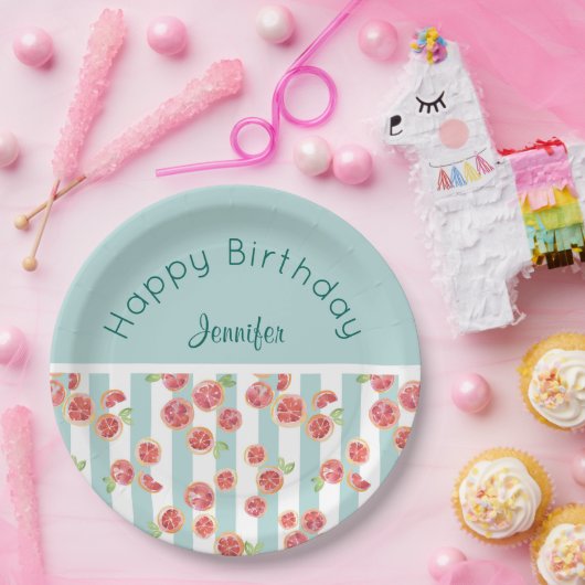 Roze grapefruitpatroon op groene strepen van afgel papieren bordje (Feest)