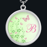 Roze groene vlinder Floral Monogram Ketting<br><div class="desc">Dit monogrammed Spring green en hot roze floral ketting heeft roze en groene Glittervlinders en bloeiende wijnstokken, samen met een sjabloon box om je monogram te personaliseren. Het komt overeen met de trouwuitnodiging hieronder en zou een mooi bruidsmeisje cadeautje maken, een meisje van eer en een cadeautje voor een bloemmeisje....</div>