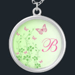 Roze groene vlinder Floral Monogram Ketting<br><div class="desc">Dit monogrammed Spring green en hot roze floral ketting heeft roze en groene Glittervlinders en bloeiende wijnstokken, samen met een sjabloon box om je monogram te personaliseren. Het komt overeen met de trouwuitnodiging hieronder en zou een mooi bruidsmeisje cadeautje maken, een meisje van eer en een cadeautje voor een bloemmeisje....</div>