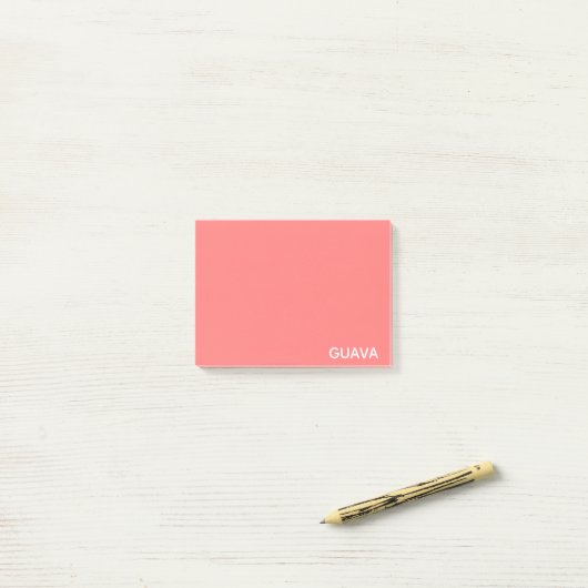 Roze guave-kleurnaam post-it® notes (Op bureau)