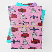 Roze Halloween-hosts, -vleermuizen en -jager op la Inpakpapier Vel (In situ)