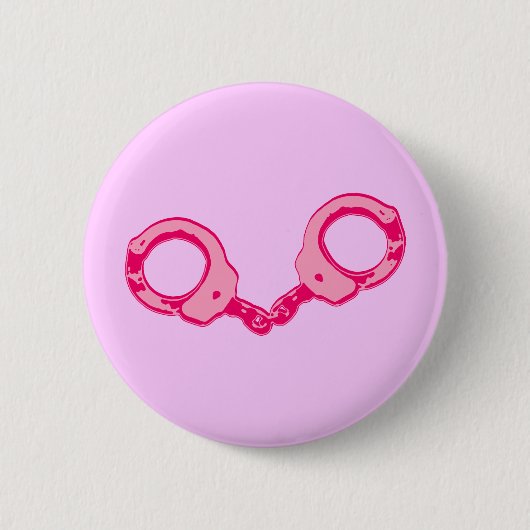 Roze handboeien ronde button 5,7 cm (Voorkant)
